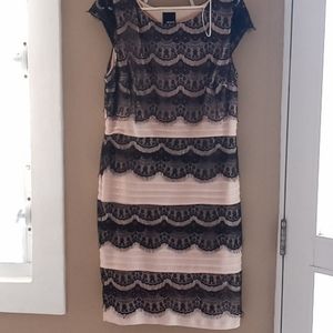 Lace cocktail dress. Light pink with black lace.